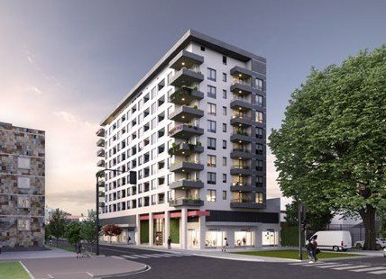 Vivienda contemporánea de fachada negra en entorno boscoso.